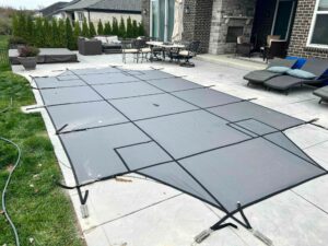 transforming-outdoor-spaces-pool-safety-covers-in-cincinnati-scaled